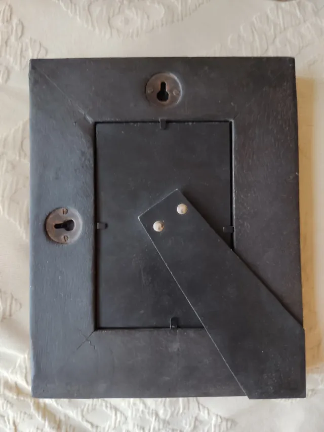 Marco de fotos decorado con flores