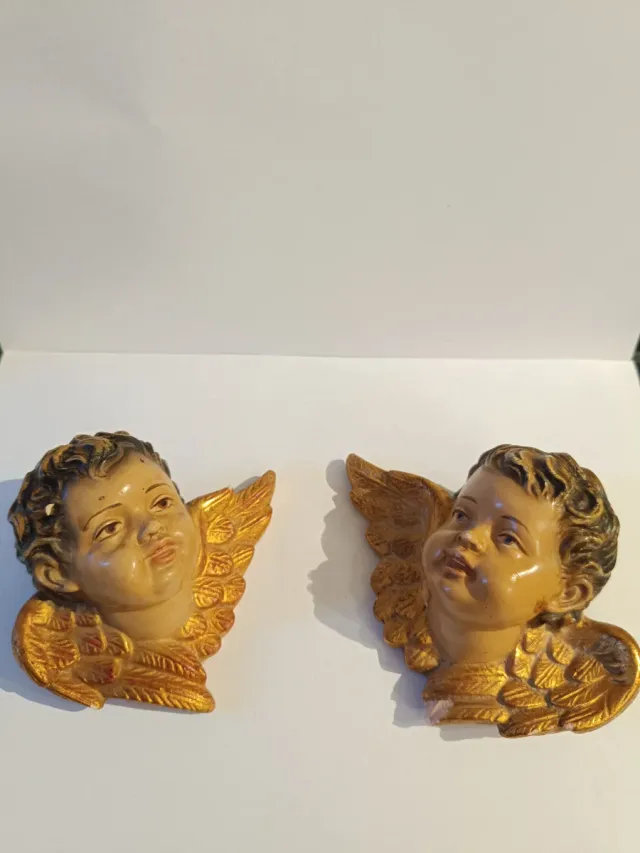 Cabezas de querubín estuco policromado