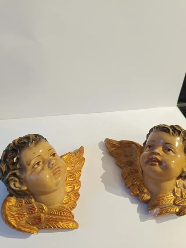 Cabezas de querubín estuco policromado