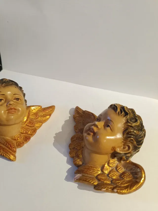 Cabezas de querubín estuco policromado