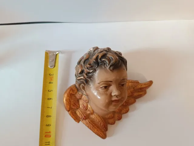 Cabezas de querubín estuco policromado