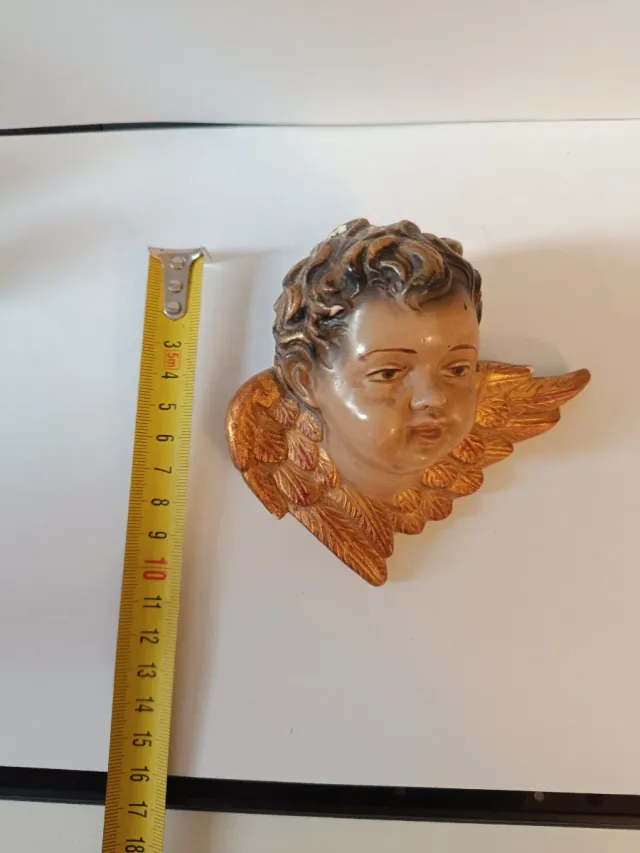 Cabezas de querubín estuco policromado