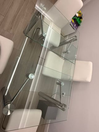 Mesa cristal diseño y 4 sillas piel