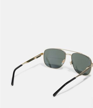 Gafas de sol Gucci unisex doradas y verdes