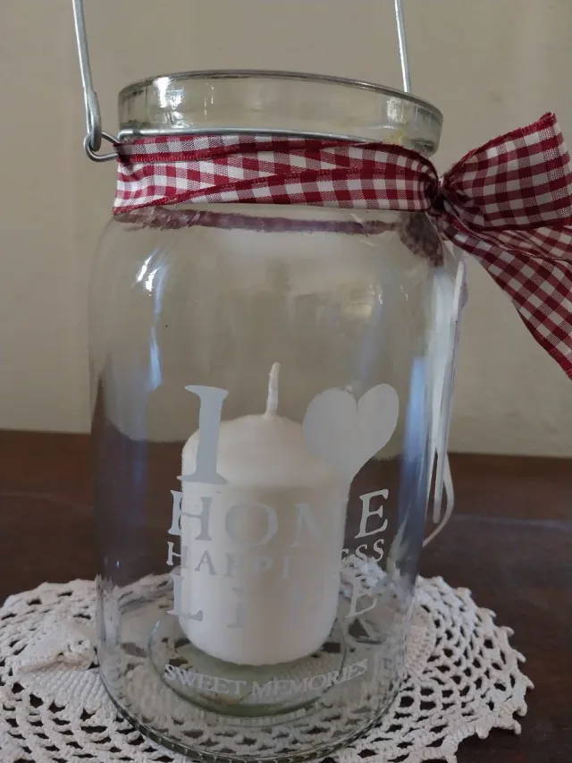 Portacandele in vetro con fiocco a quadri rossi