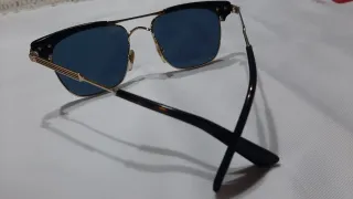 Occhiali da sole Gucci neri e oro