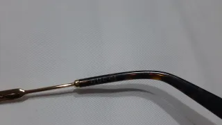 Occhiali da sole Gucci neri e oro