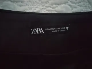 Minifalda polipiel Zara cremallera asimétrica