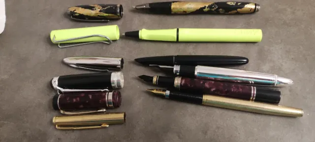 Set di 4 penne e 2 roller.