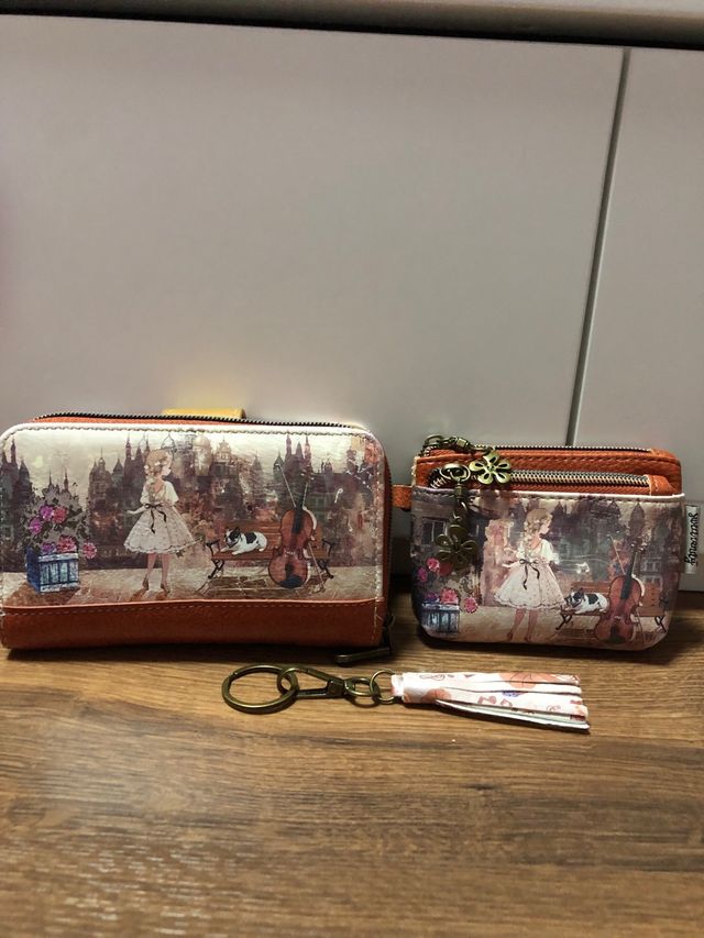 Pack 2 monederos con diseño de chica y violín