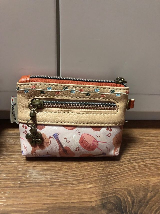 Pack 2 monederos con diseño de chica y violín