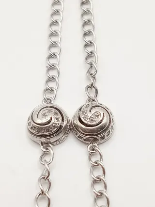 Braccialetto donna con ciondoli a spirale argento