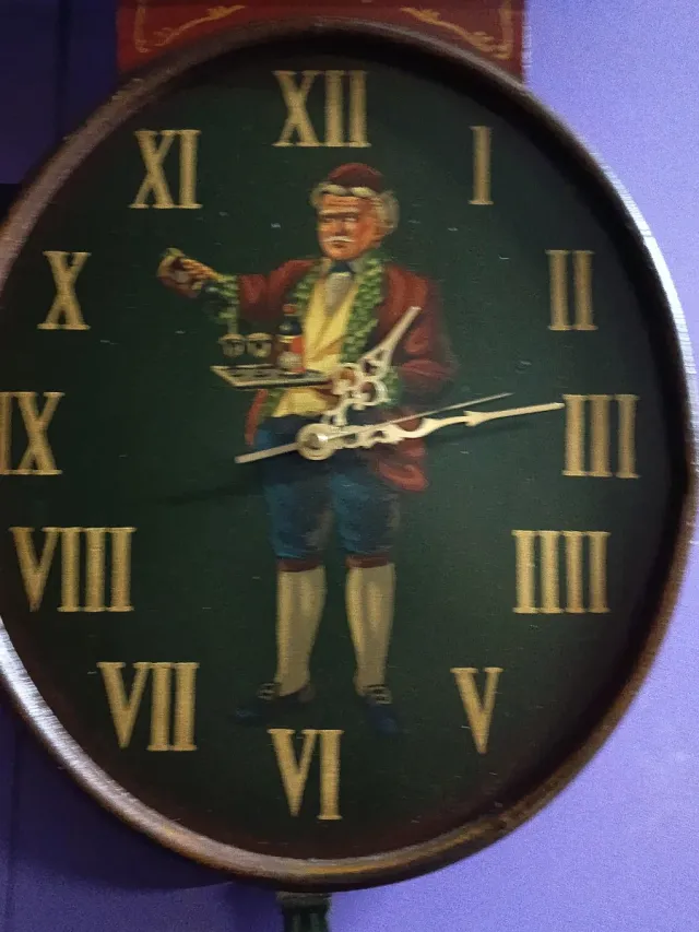 Orologio da parete antico pubblicitario