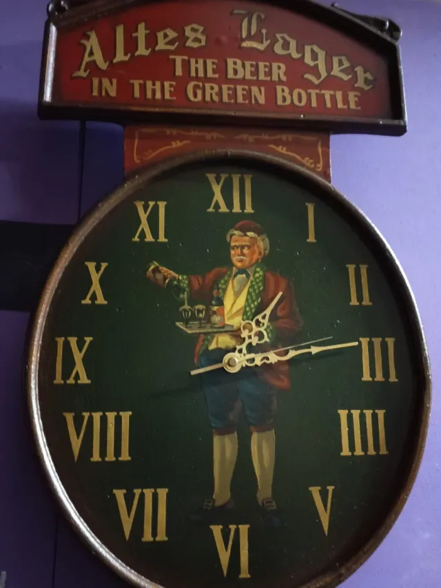 Orologio da parete antico pubblicitario