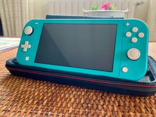 Nintendo Switch Lite Turchese + gioco