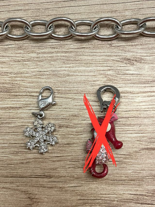 Pulsera Swarovski con charms varios