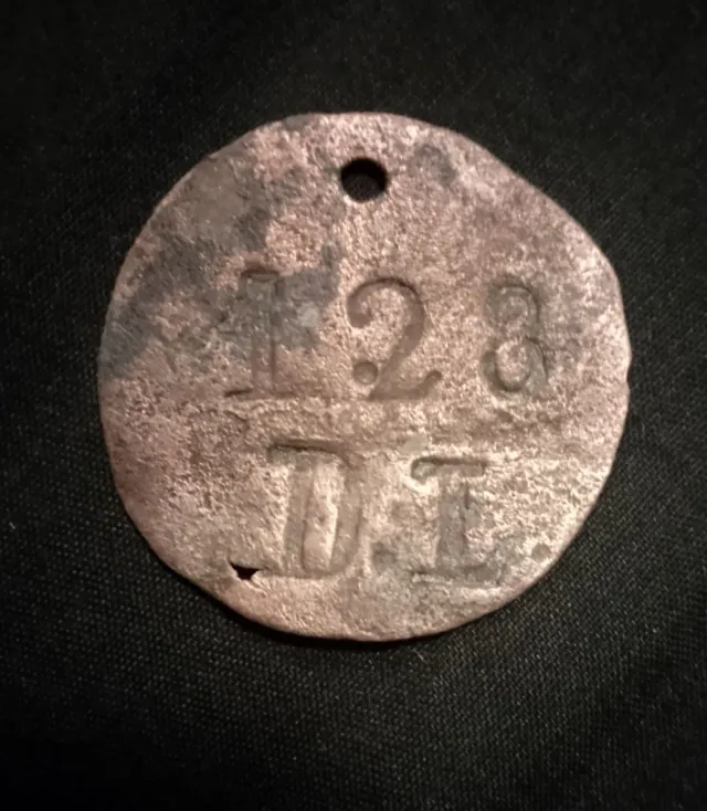 Ficha dineraria antigua 128 D.L.