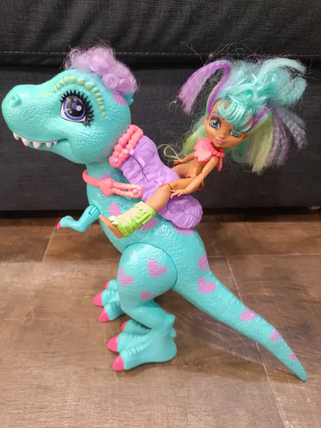 Figura Dinosaurio con Muñeca