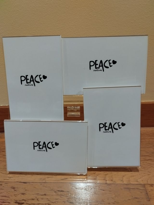 4 Portafotos Natura en un soporte de metacrilato