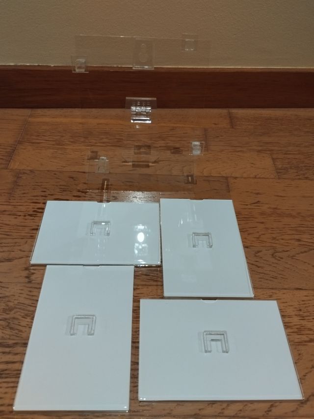 4 Portafotos Natura en un soporte de metacrilato