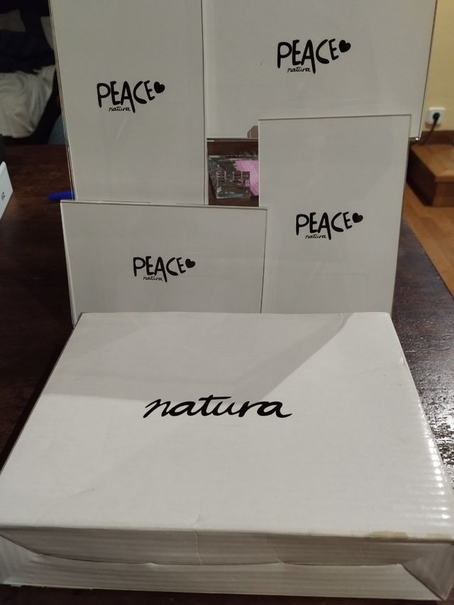 4 Portafotos Natura en un soporte de metacrilato