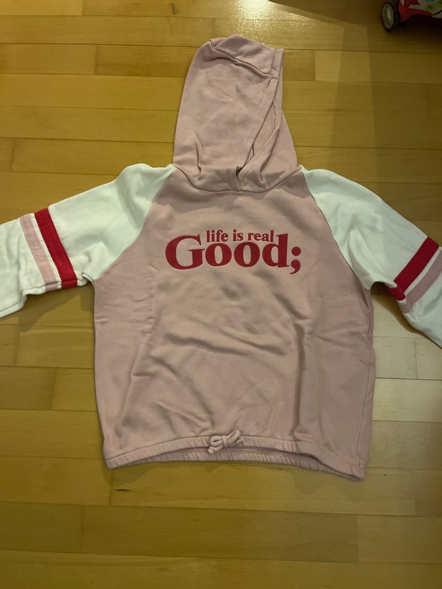 Sudadera rosa y blanca con cordón