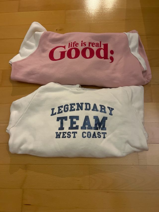 Sudadera rosa y blanca con cordón