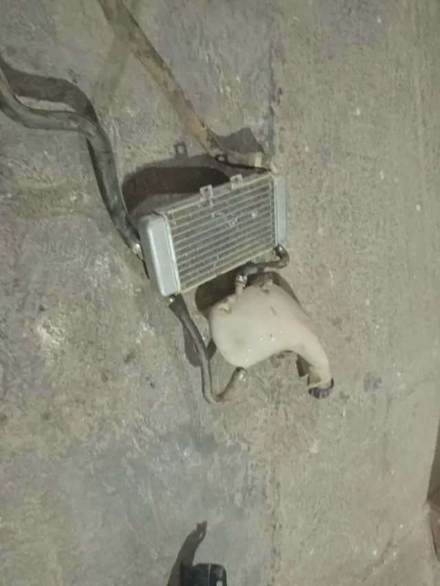 Radiador Piaggio con bote expansor