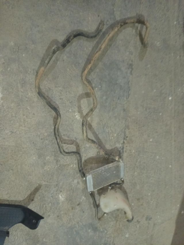 Radiador Piaggio con bote expansor