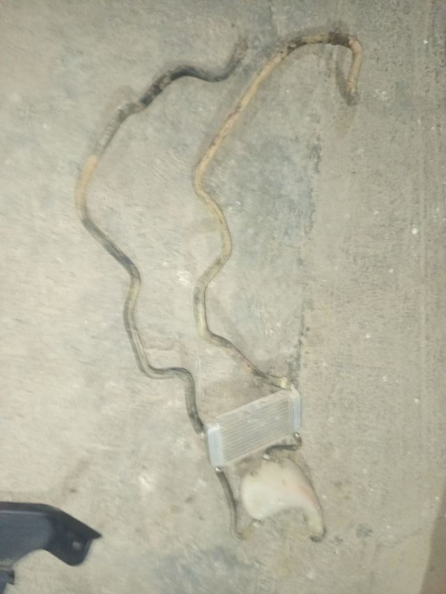 Radiador Piaggio con bote expansor