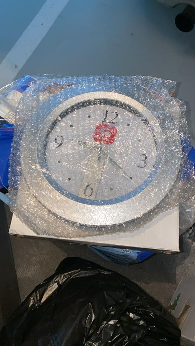 Orologio da parete argentato nuovo