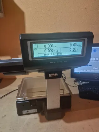 Balanza DIBAL con ticket y pegatinas GARANTIA