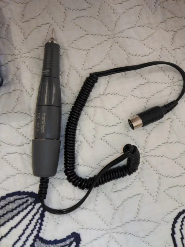 Maquina perforadora y micromotor