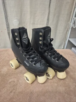 Patines Oxelo 4 ruedas talla 34 negros