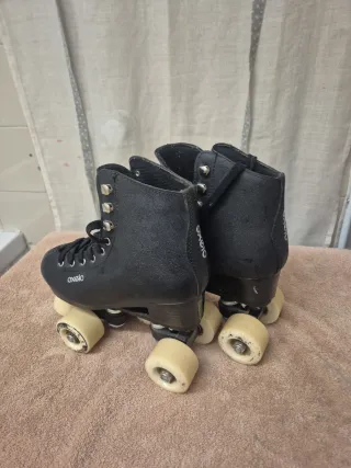 Patines Oxelo 4 ruedas talla 34 negros