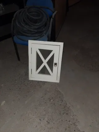 Ventanas de madera con diseño X