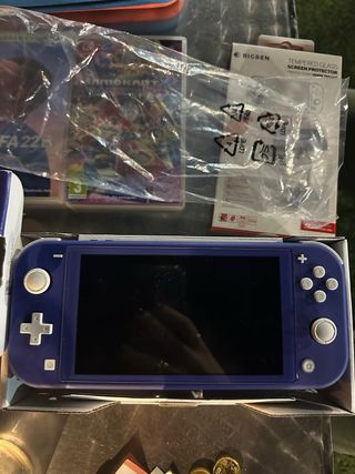 Nintendo Switch Lite + 3 Giochi + Accessori