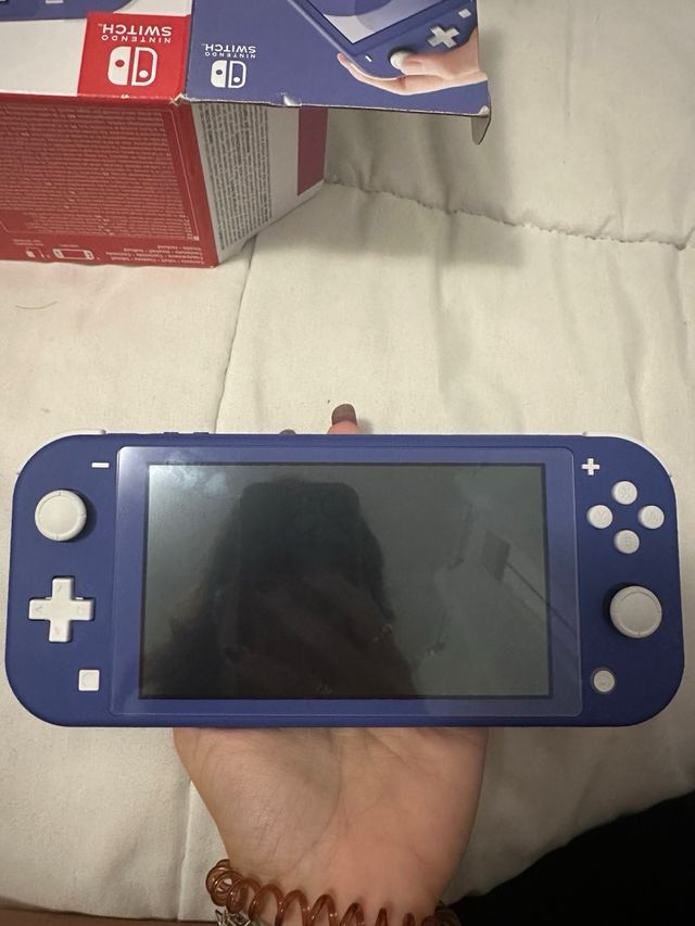 Nintendo Switch Lite + 3 Giochi + Accessori