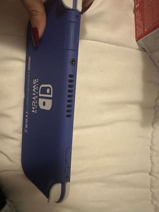 Nintendo Switch Lite + 3 Giochi + Accessori