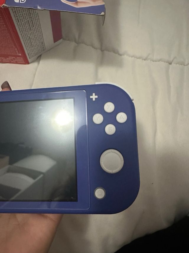 Nintendo Switch Lite + 3 Giochi + Accessori
