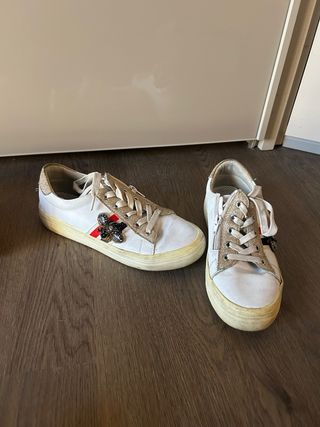 Scarpe da ginnastica bianche e oro