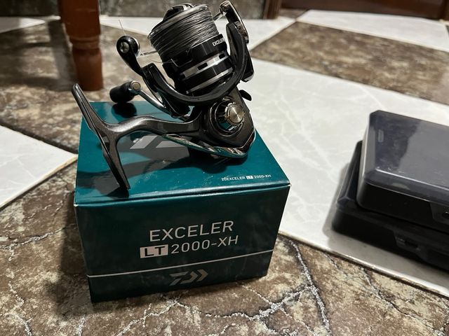 Carrete y señuelos pesca spinning carrete 2 salida