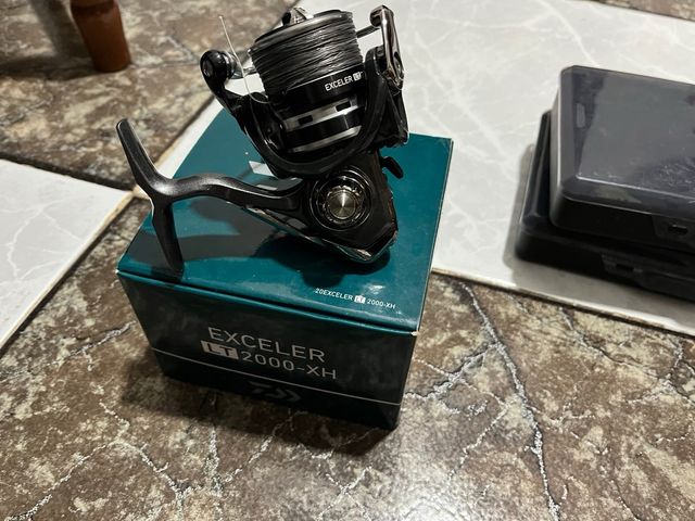 Carrete y señuelos pesca spinning carrete 2 salida