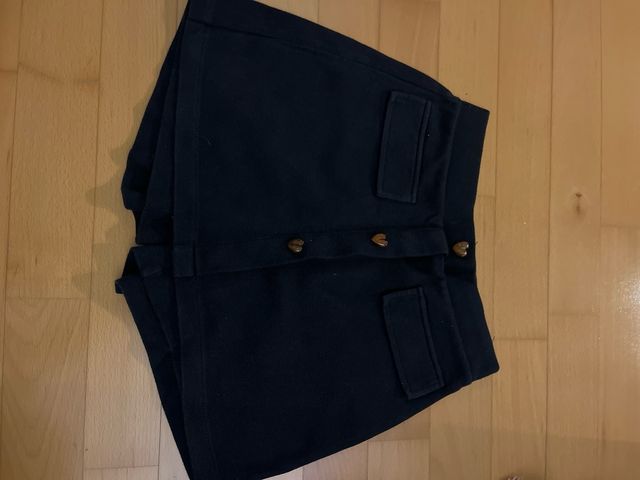 Faldas cortas Mayoral negras y doradas