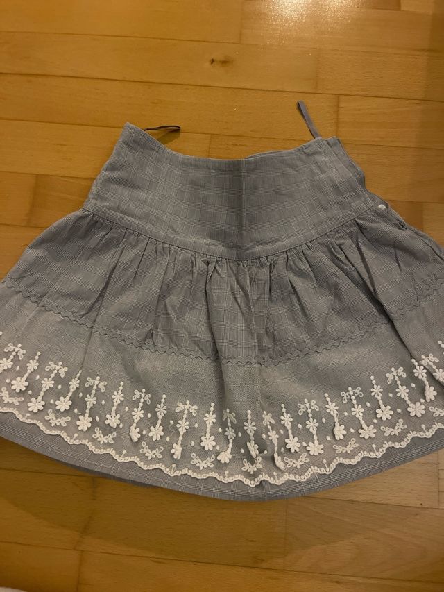 Faldas cortas Mayoral negras y doradas