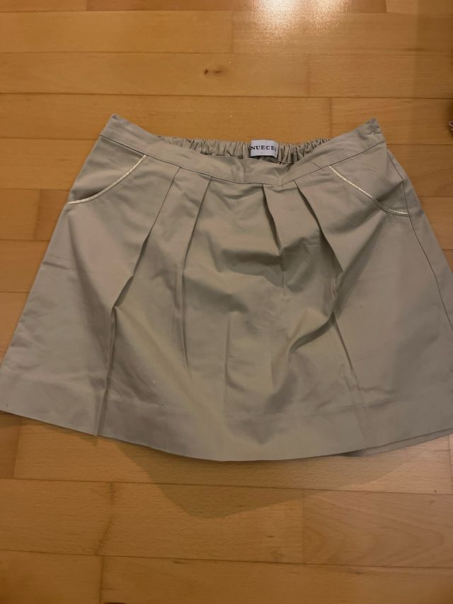 Faldas cortas Mayoral negras y doradas