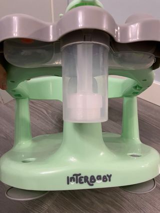 Asiento de baño para bebé con juguetes