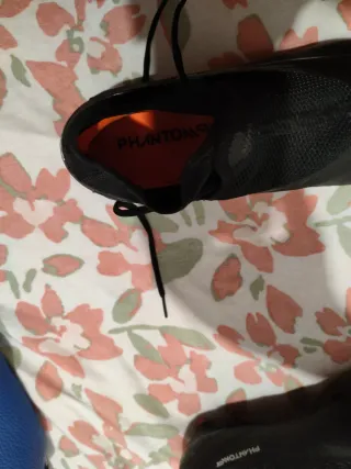 Nike Phantom botas de fútbol.