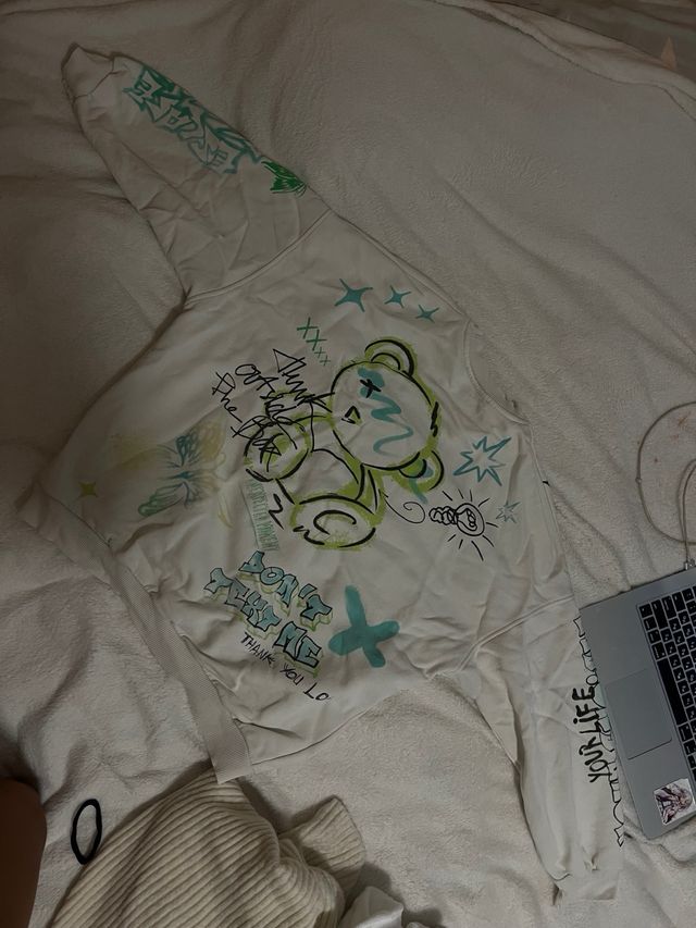 Sudadera gráfica blanca y verde