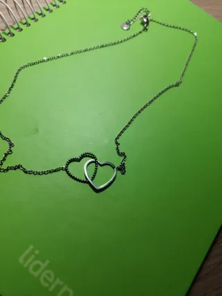 Colgante dos corazones plateado acero